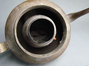 铜制温酒壶收藏与市场 从拍卖交流到金属制造工艺探析